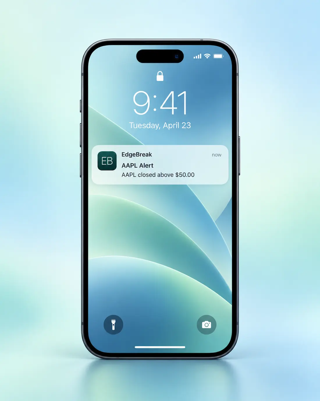 A phone displaying an EdgeBreak stock alert notification